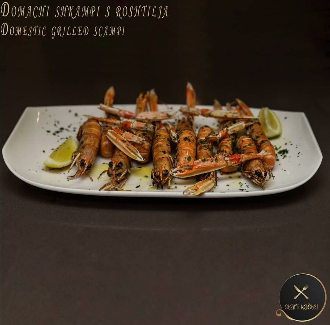 Domestic grilled scampi with lemon — fresh Adriatic seafood Novalja